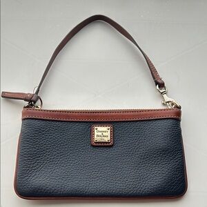 Dooney and Bourke Large Slim‎ Wristlet Pebble Grain Leather Navy w/ Gold details